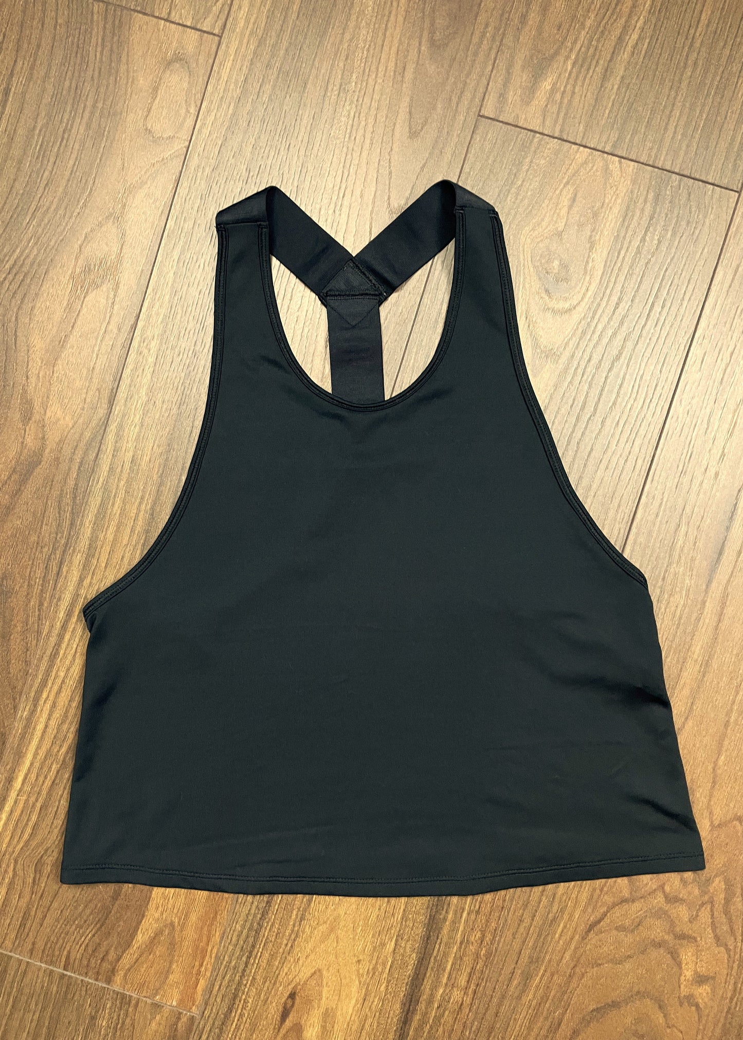 Αμάνικη, Γυναικεία Αθλητική Μπλούζα UNDER ARMOUR σε Μαύρο χρώμα (Medium)