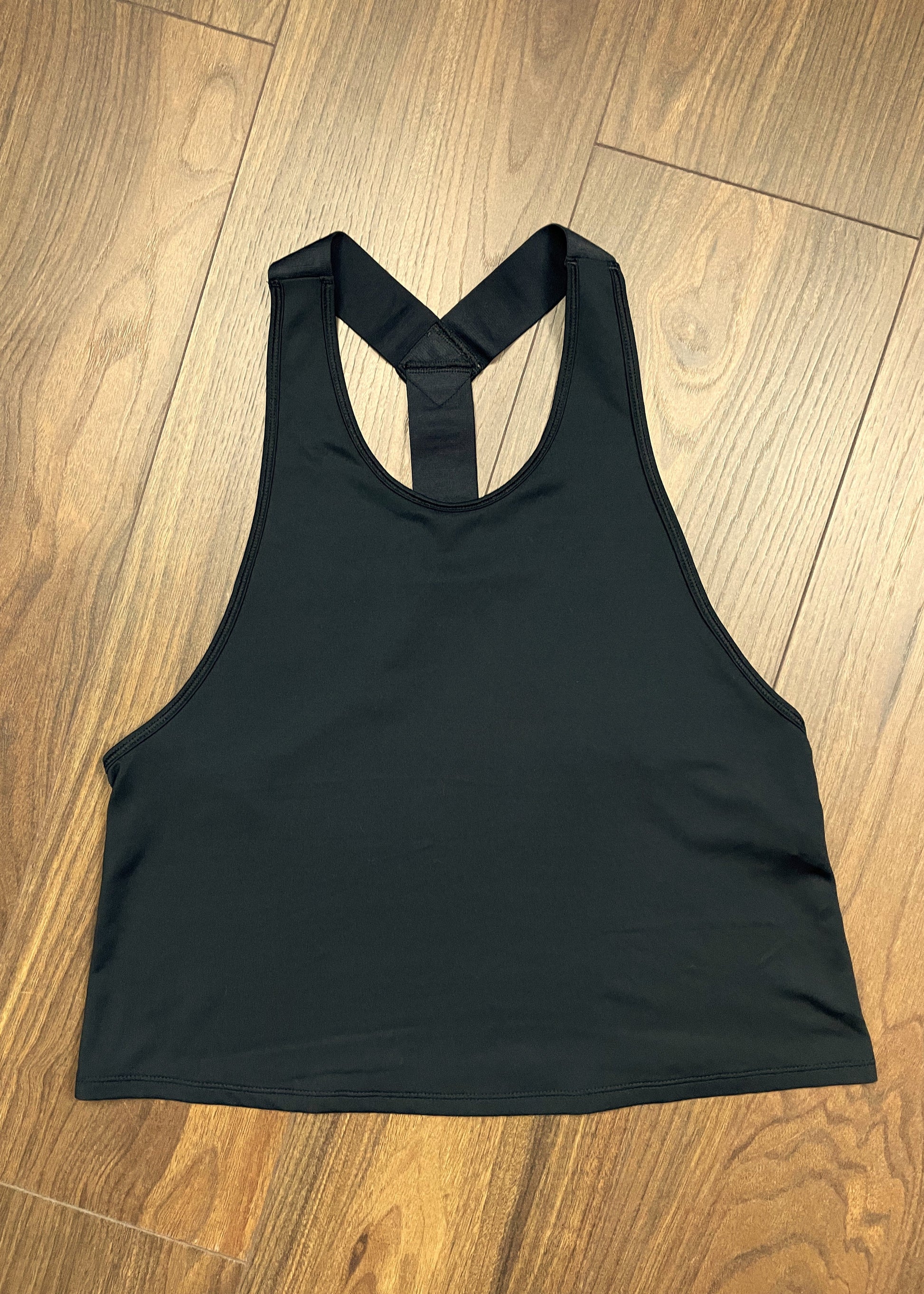 Αμάνικη, Γυναικεία Αθλητική Μπλούζα UNDER ARMOUR σε Μαύρο χρώμα (Medium)